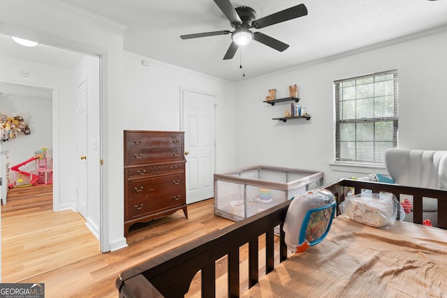 144 Winding Way, Statesboro, GA 30461 - bedroom featuring light wood-style floors, crown molding, and ceiling fan