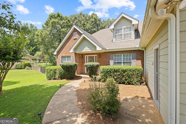 20 Knollwood Pl, Covington, GA 30014 - view of front of property with roof with shingles, brick siding, and a front yard