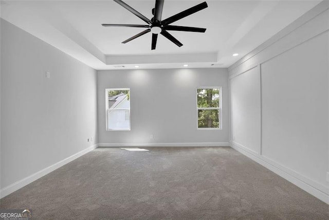 5719 Calm Vly, Flowery Branch, GA 30542 - carpeted spare room featuring a raised ceiling, recessed lighting, and ceiling fan