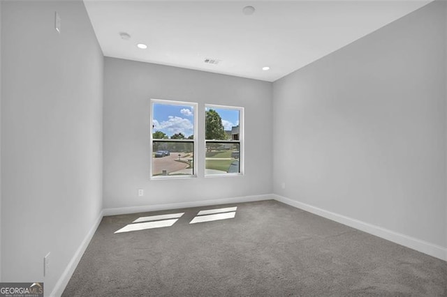 5719 Calm Vly, Flowery Branch, GA 30542 - empty room featuring carpet and recessed lighting