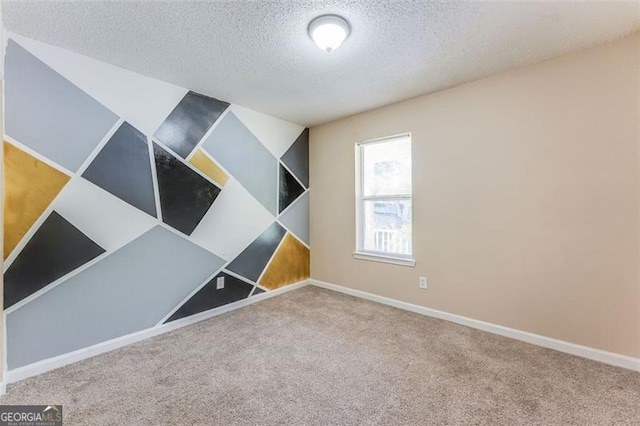179 Glynn Addy, Stockbridge, GA 30281 - carpeted empty room with a textured ceiling and baseboards