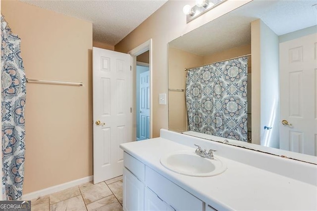 179 Glynn Addy, Stockbridge, GA 30281 - full bathroom featuring vanity, a textured ceiling, and tile patterned floors