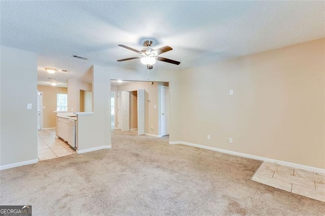 179 Glynn Addy, Stockbridge, GA 30281 - spare room with light carpet, ceiling fan, and a textured ceiling