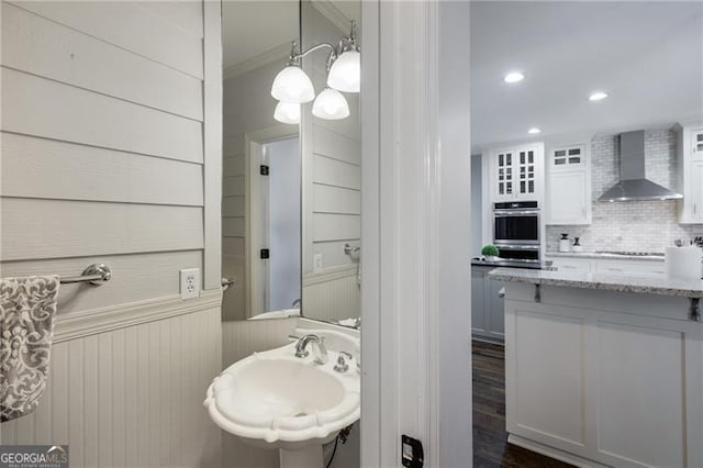 13520 Providence Lk, Alpharetta, GA 30004 - bathroom featuring backsplash, recessed lighting, a wainscoted wall, and ornamental molding