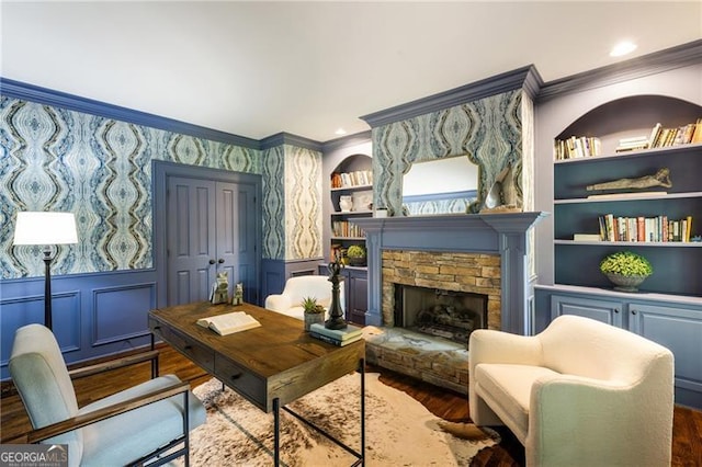 13520 Providence Lk, Alpharetta, GA 30004 - office featuring ornamental molding, a wainscoted wall, wood finished floors, a stone fireplace, and wallpapered walls