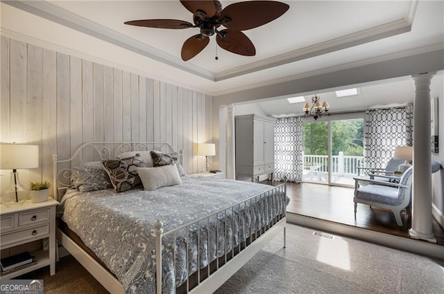 13520 Providence Lk, Alpharetta, GA 30004 - bedroom with access to exterior, ornamental molding, ornate columns, a raised ceiling, and a chandelier