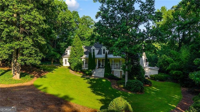 13520 Providence Lk, Alpharetta, GA 30004 - cape cod house featuring a front yard and covered porch