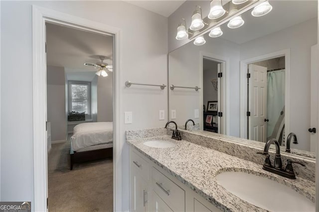 13520 Providence Lk, Alpharetta, GA 30004 - ensuite bathroom featuring double vanity and a ceiling fan