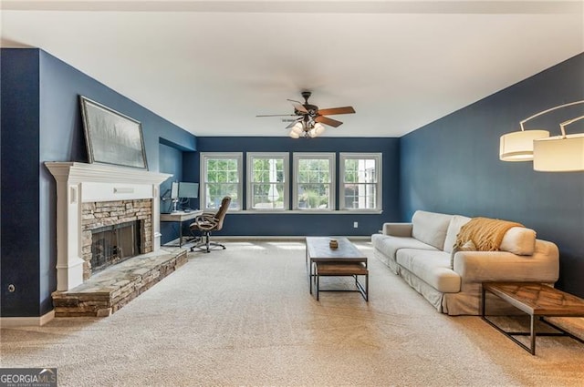 13520 Providence Lk, Alpharetta, GA 30004 - carpeted living area featuring ceiling fan and a stone fireplace