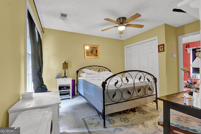 4636 Chamblee Tucker Rd, Tucker, GA 30084 - bedroom with a closet, ceiling fan, and concrete floors