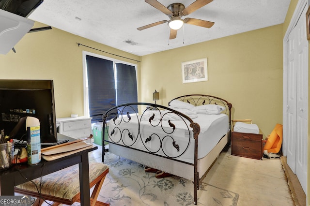 4636 Chamblee Tucker Rd, Tucker, GA 30084 - bedroom with a closet, a ceiling fan, and a desk