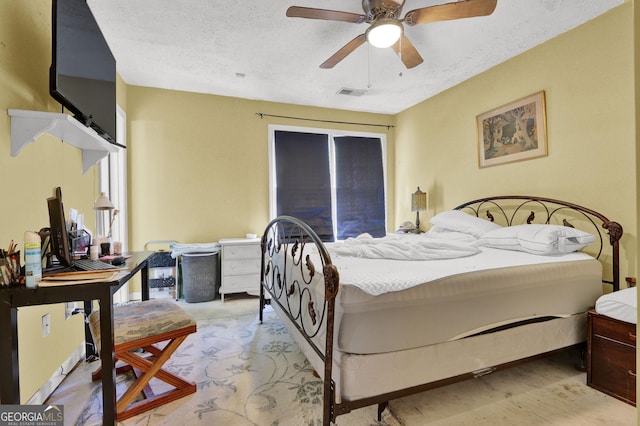4636 Chamblee Tucker Rd, Tucker, GA 30084 - bedroom with ceiling fan and a textured ceiling