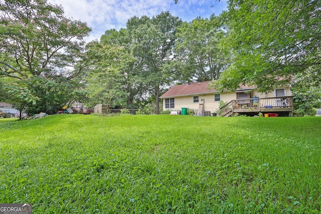 4636 Chamblee Tucker Rd, Tucker, GA 30084 - view of grassy yard with a deck