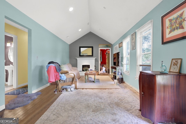 4636 Chamblee Tucker Rd, Tucker, GA 30084 - living room with a fireplace, wood finished floors, and vaulted ceiling