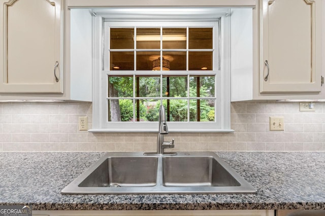829 Bev Ct, Lawrenceville, GA 30046 - kitchen with white cabinetry and backsplash