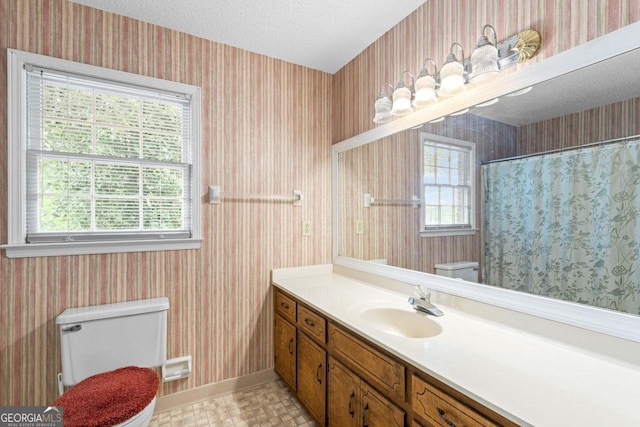 829 Bev Ct, Lawrenceville, GA 30046 - bathroom featuring wallpapered walls, vanity, a textured ceiling, and curtained shower
