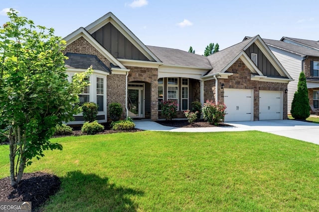 2844 Bluestone Dr SW, South Fulton, GA 30331 - craftsman inspired home with board and batten siding, concrete driveway, a front lawn, and stone siding