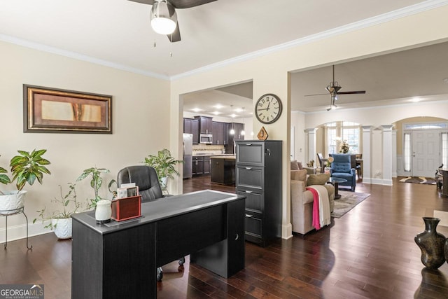 2844 Bluestone Dr SW, South Fulton, GA 30331 - office featuring ornate columns, a ceiling fan, arched walkways, ornamental molding, and dark wood-style flooring