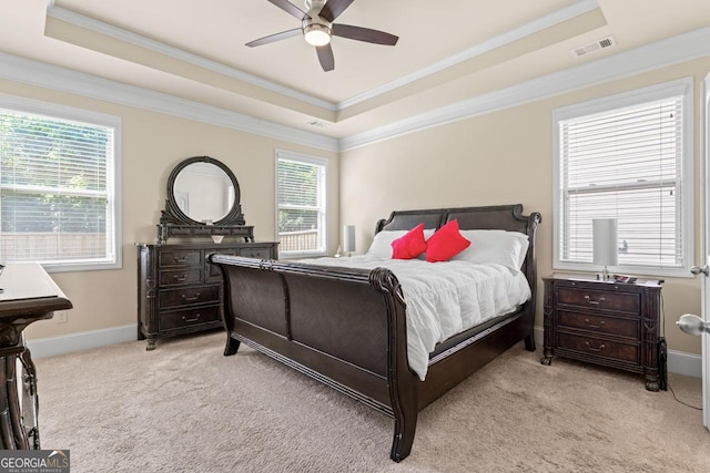 2844 Bluestone Dr SW, South Fulton, GA 30331 - bedroom with a tray ceiling, light carpet, ornamental molding, and a ceiling fan