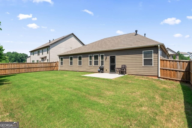 2844 Bluestone Dr SW, South Fulton, GA 30331 - back of house with a fenced backyard, a patio, and a shingled roof