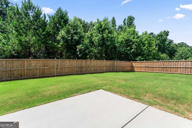 2844 Bluestone Dr SW, South Fulton, GA 30331 - fenced backyard with a patio area