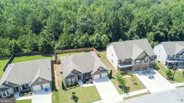 2844 Bluestone Dr SW, South Fulton, GA 30331 - aerial view of residential area with a heavily wooded area