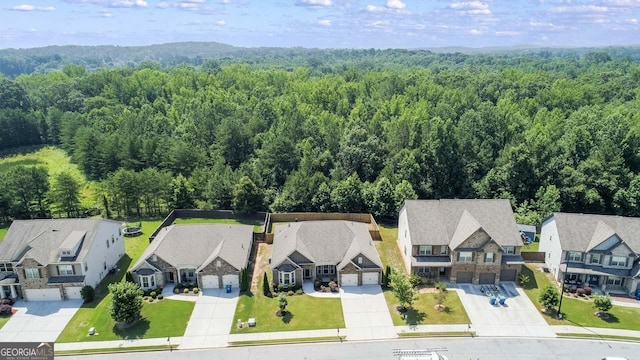 2844 Bluestone Dr SW, South Fulton, GA 30331 - aerial perspective of suburban area featuring a heavily wooded area
