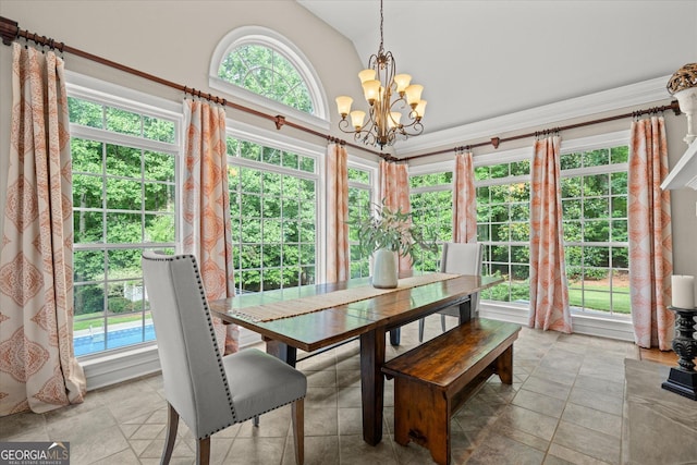 9125 Patrick Pl, Winston, GA 30187 - dining area featuring a chandelier and vaulted ceiling