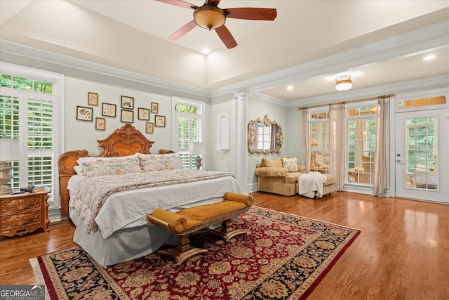 9125 Patrick Pl, Winston, GA 30187 - bedroom with access to exterior, multiple windows, ornamental molding, and wood finished floors
