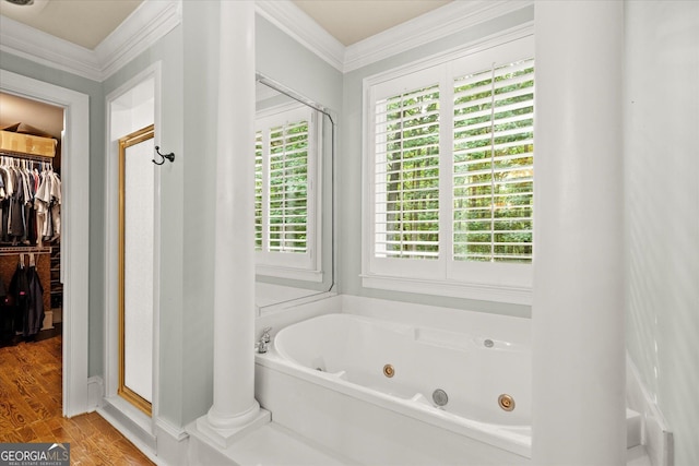 9125 Patrick Pl, Winston, GA 30187 - full bath featuring a shower stall, a walk in closet, a whirlpool tub, crown molding, and wood finished floors