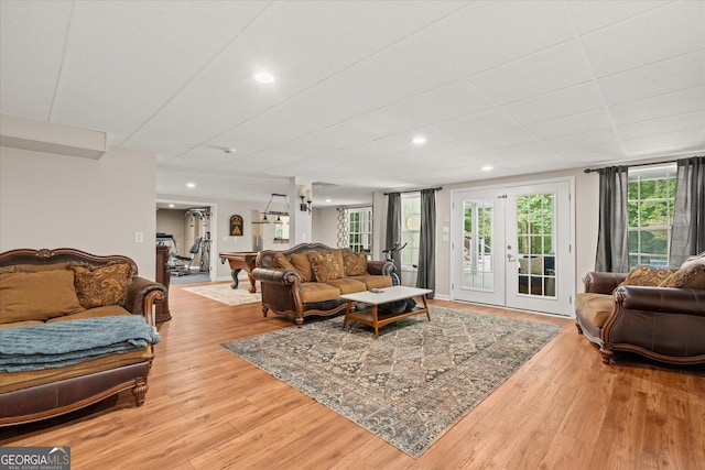 9125 Patrick Pl, Winston, GA 30187 - living area featuring french doors, wood finished floors, and recessed lighting