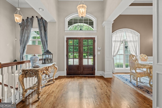9125 Patrick Pl, Winston, GA 30187 - foyer with wood finished floors, ornamental molding, and french doors