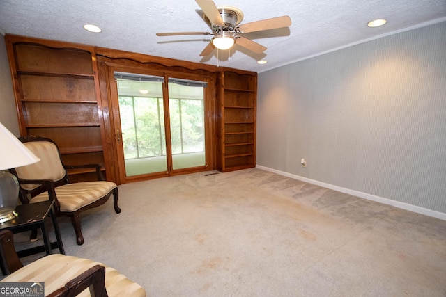 195 Hudgen Rd, Newnan, GA 30265 - living area with ceiling fan, light colored carpet, a textured ceiling, wallpapered walls, and recessed lighting