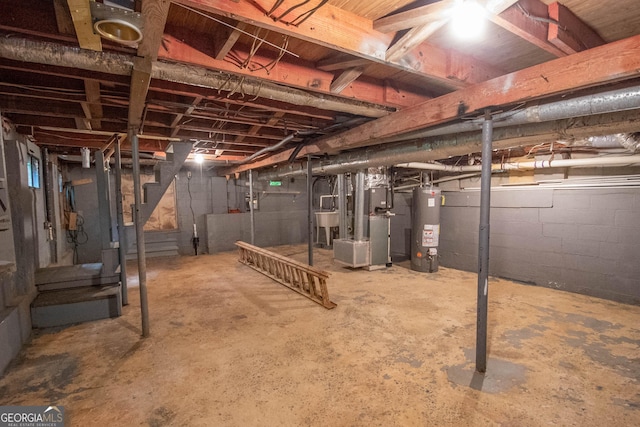 195 Hudgen Rd, Newnan, GA 30265 - unfinished below grade area with gas water heater and stairs