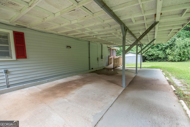 195 Hudgen Rd, Newnan, GA 30265 - view of patio / terrace featuring a shed and an attached carport
