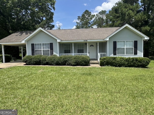 1013 E Cumberland Ct, Bainbridge, GA 39817 - ranch-style house featuring covered porch, roof with shingles, and a front lawn