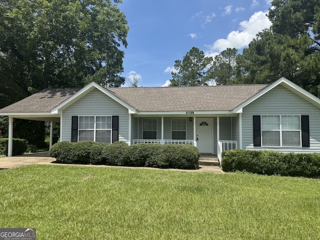 1013 E Cumberland Ct, Bainbridge, GA 39817 - ranch-style house with a porch, roof with shingles, and a front yard