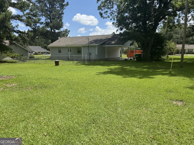 1013 E Cumberland Ct, Bainbridge, GA 39817 - view of yard with an attached carport