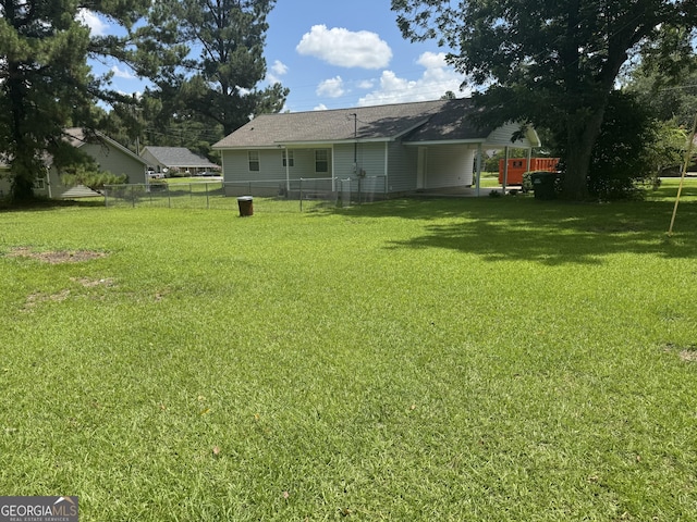 1013 E Cumberland Ct, Bainbridge, GA 39817 - view of yard with a carport