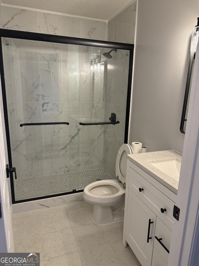 1013 E Cumberland Ct, Bainbridge, GA 39817 - bathroom with vanity and a marble finish shower