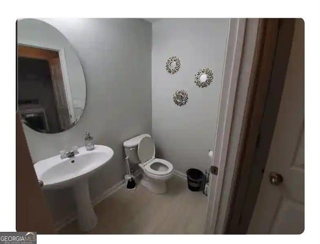 2619 Parrish, Lithonia, GA 30038 - bathroom featuring toilet and a sink