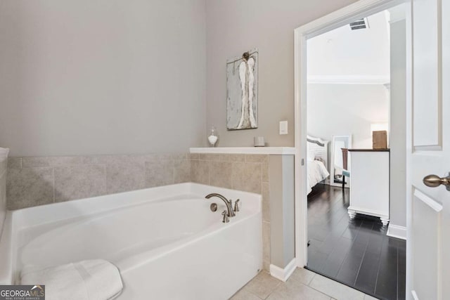 2520 Carmel Way, Alpharetta, GA 30009 - bathroom with a bath, ensuite bath, and tile patterned flooring