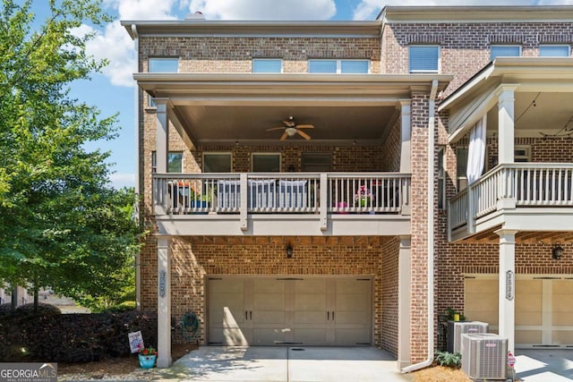 2520 Carmel Way, Alpharetta, GA 30009 - back of property with an attached garage, a balcony, and brick siding