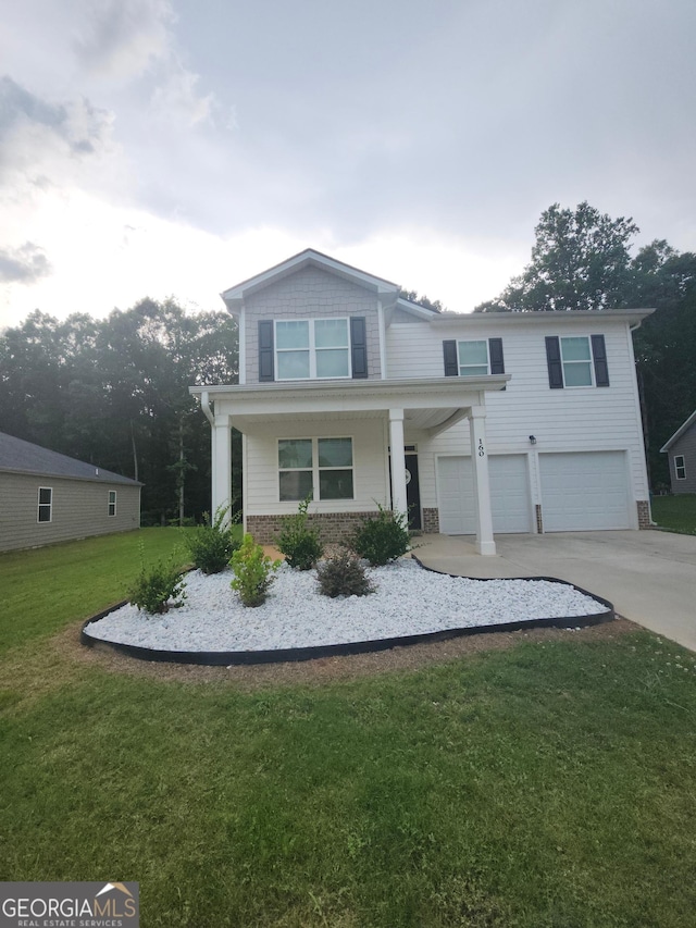 160 Grafton St, Hampton, GA 30228 - view of front facade with a garage, concrete driveway, a front lawn, and brick siding
