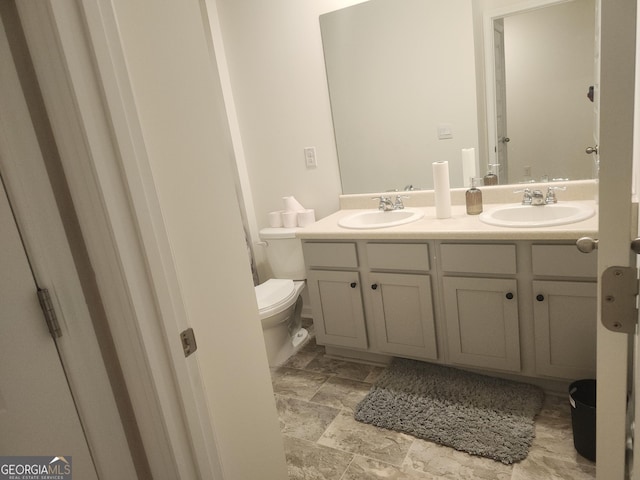 160 Grafton St, Hampton, GA 30228 - bathroom featuring double vanity and toilet