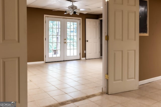 312 N Briar Rdg, Woodstock, GA 30189 - doorway with french doors, a drop ceiling, a ceiling fan, and light tile patterned floors