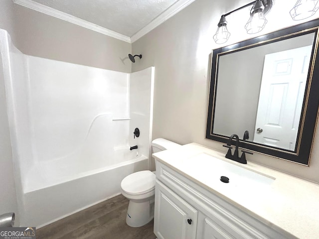 35 Belmont Way, Covington, GA 30016 - full bathroom featuring crown molding, wood finished floors, vanity, and  shower combination