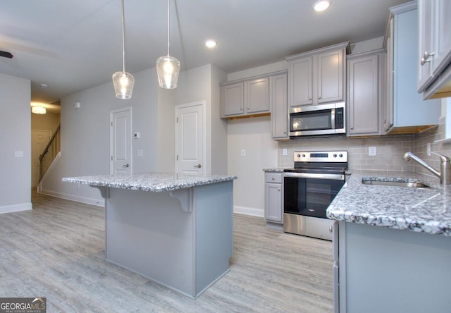 117 Greenview Ct Unit 1302, Homer, GA 30547 - kitchen with stainless steel appliances, light wood-style floors, gray cabinets, and recessed lighting