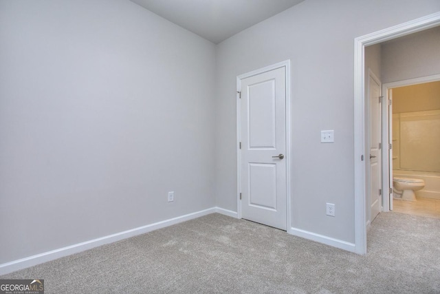 117 Greenview Ct Unit 1302, Homer, GA 30547 - unfurnished bedroom featuring carpet flooring and baseboards