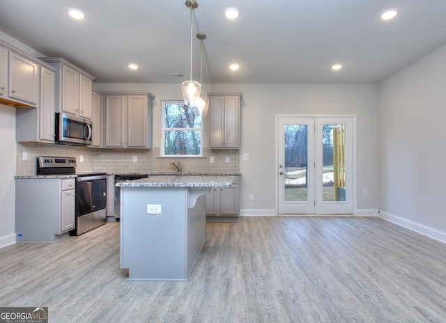 117 Greenview Ct Unit 1302, Homer, GA 30547 - kitchen featuring stainless steel appliances, gray cabinets, light wood-type flooring, backsplash, and recessed lighting